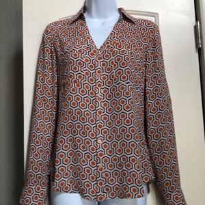 A orange and white blouse